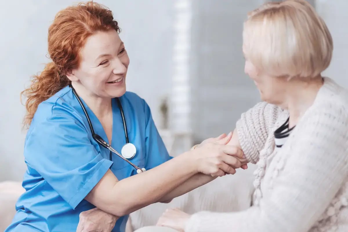 Certified nursing assistant examining a patient Certified nursing assistant examining a patient