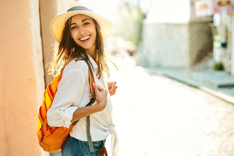 Travel nurse smiling while out on assignment