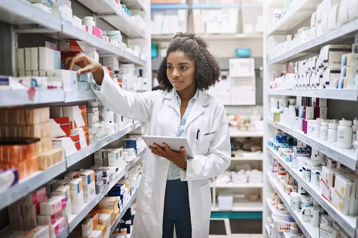 Pharmacist filling prescriptions