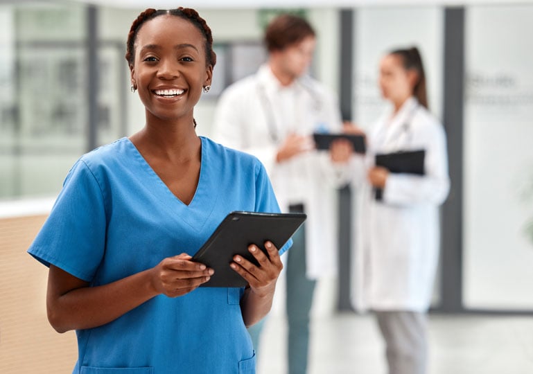 Nurse smiling while at work