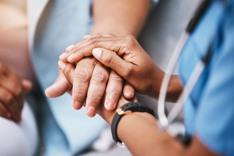 A direct hire nurse helping a patient