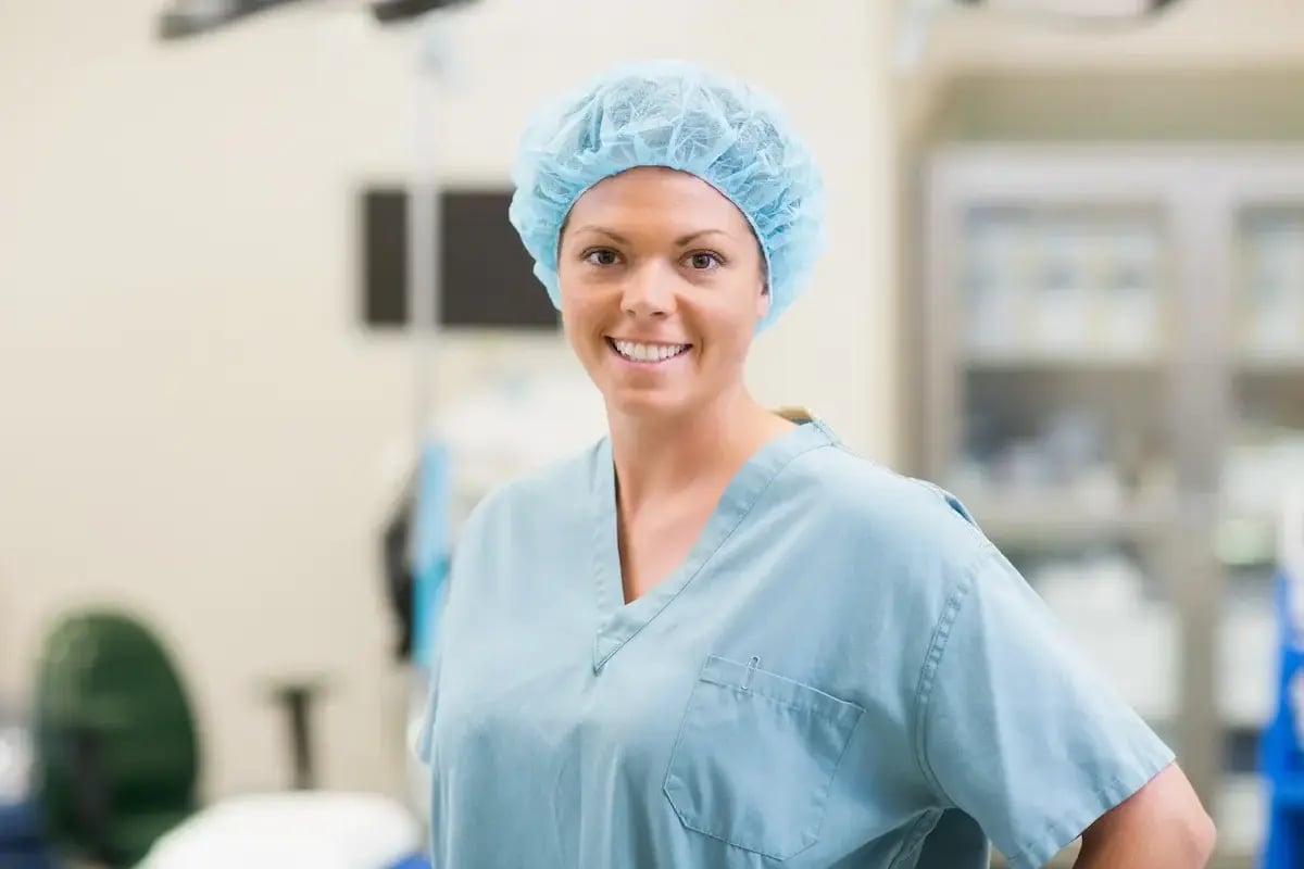 Certified surgical tech smiling while working