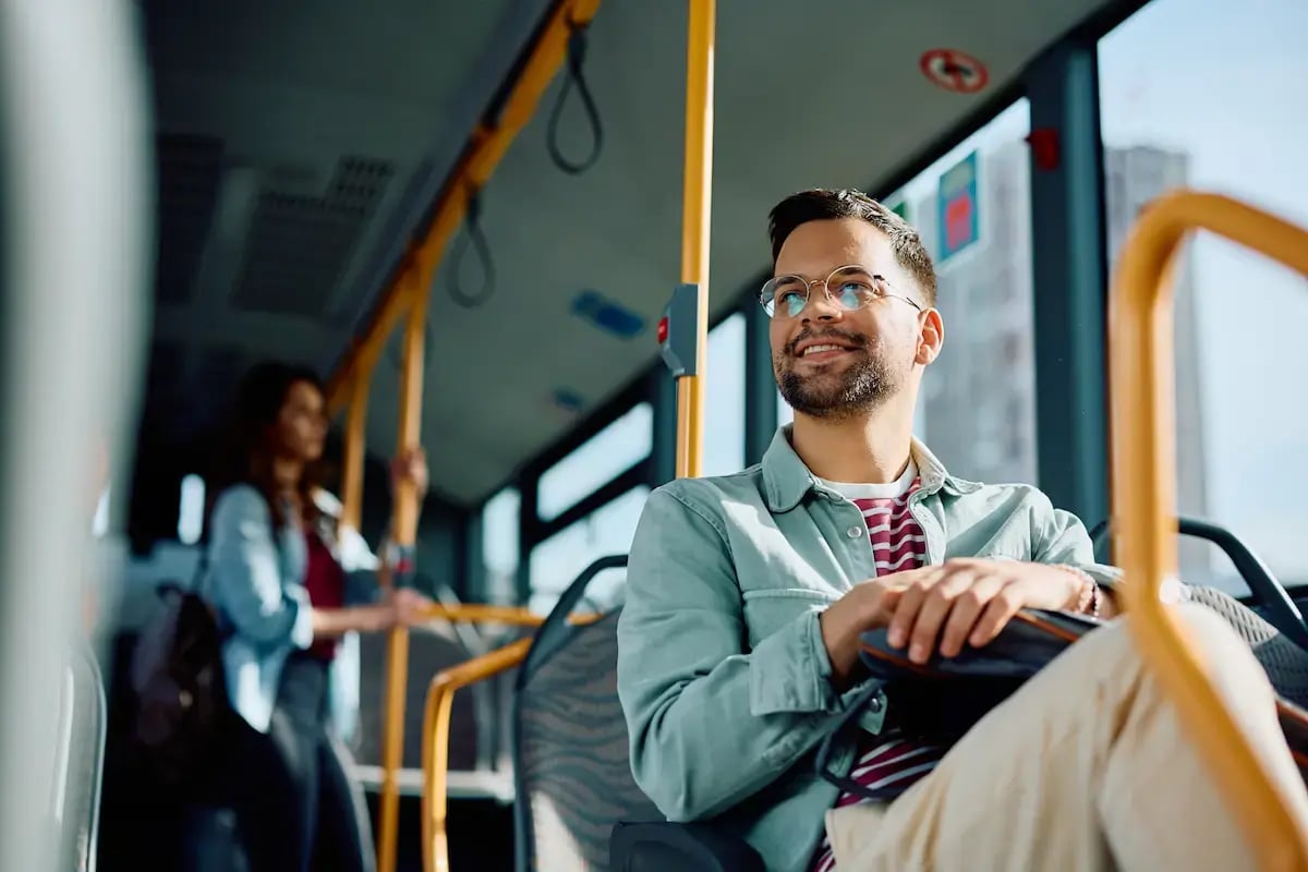 Travel echo tech sitting on public transportation Travel echo tech sitting on public transportation