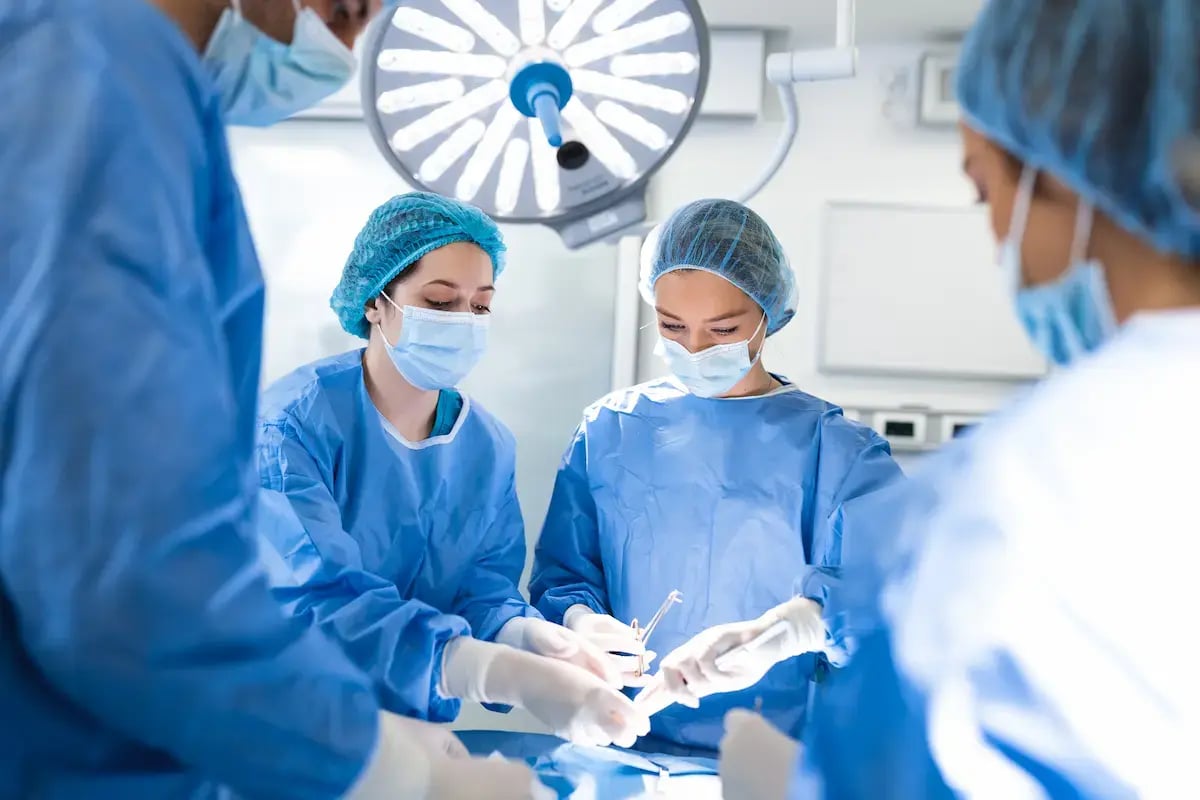 RNFA assisting a doctor during surgery RNFA assisting a doctor during surgery