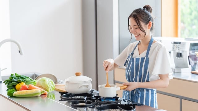 Woman cooking in a kitchen