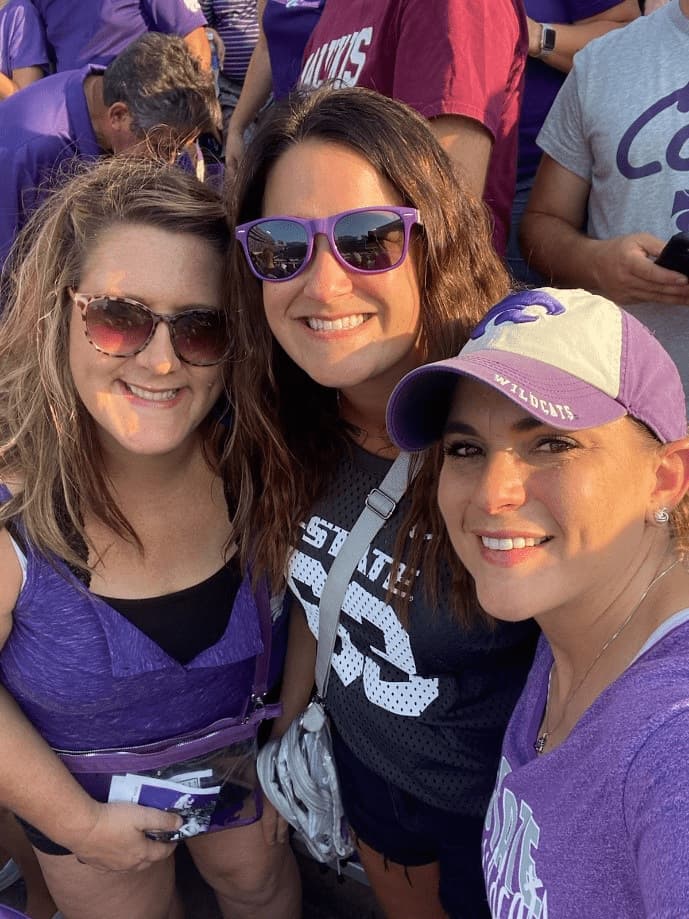 Kathy with friends at a Kansas State football game 