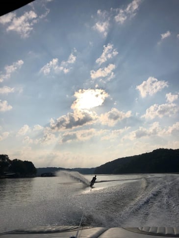 John water skiing on the lake 