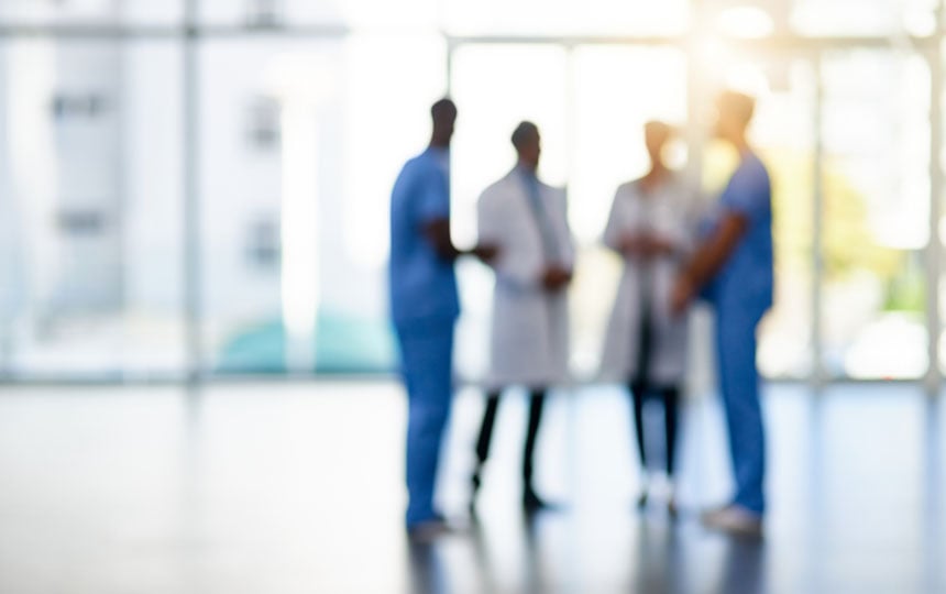 Healthcare workers talking in a hospital