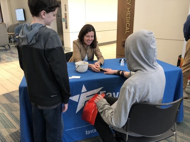 Kelly Grebe teaching future healthcare professionals about medical careers