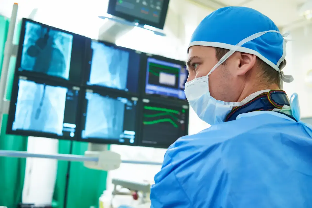 Surgeon looking at xrays