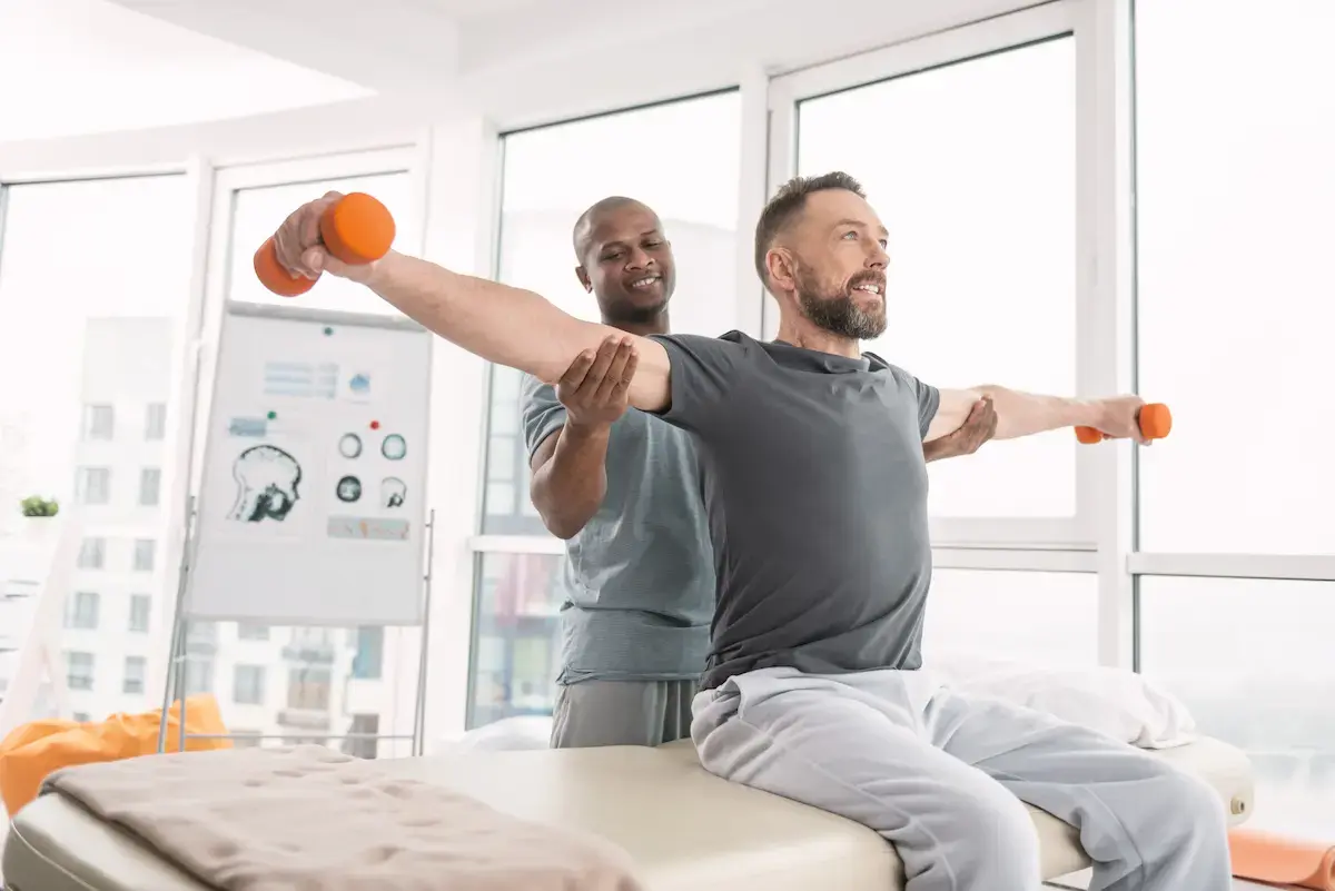 Patient at a clinic receives physical therapy care