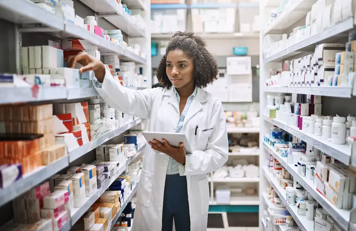 Pharmacist filling a prescription for a patient