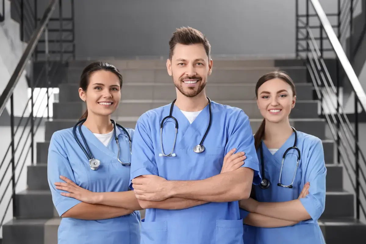 RNs smiling and crossing their arms