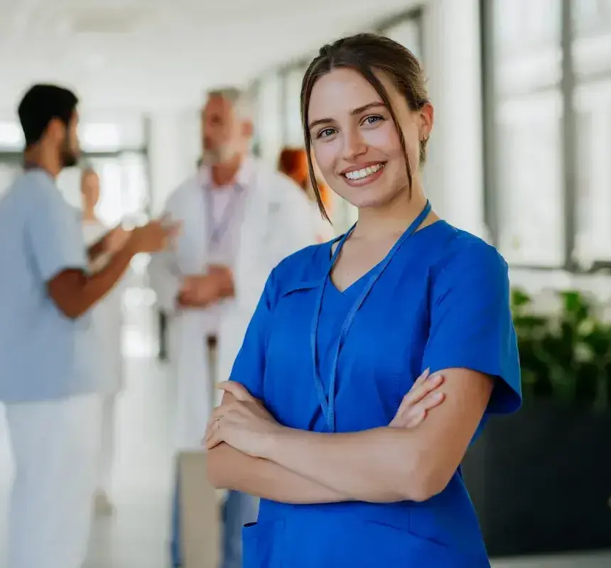 Phlebotomist smiling and crossing her hands
