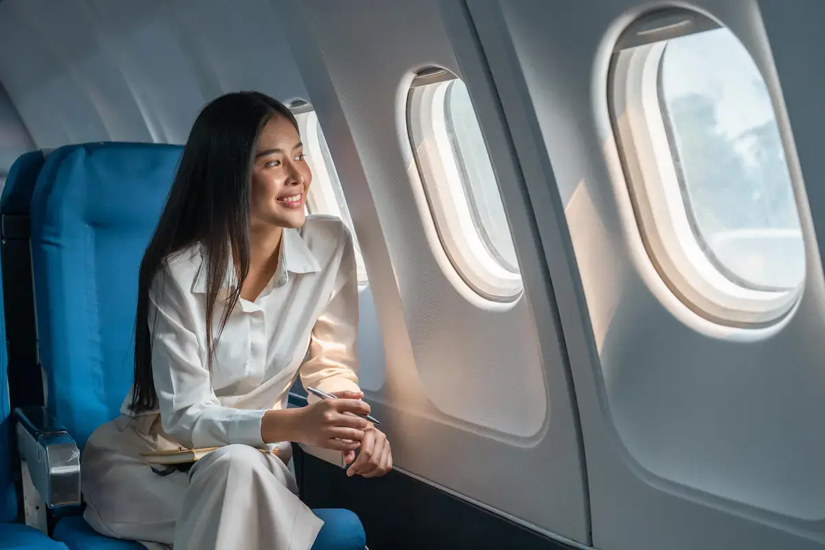 Travel MA on an airplane on their way to their next contract