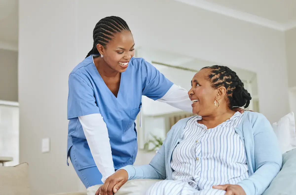 LPN talking to a patient in their home
