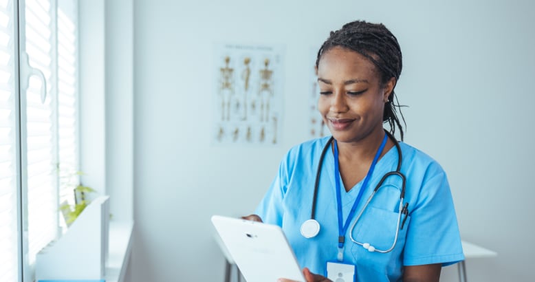 Woman using a clipboard in a doctor's office